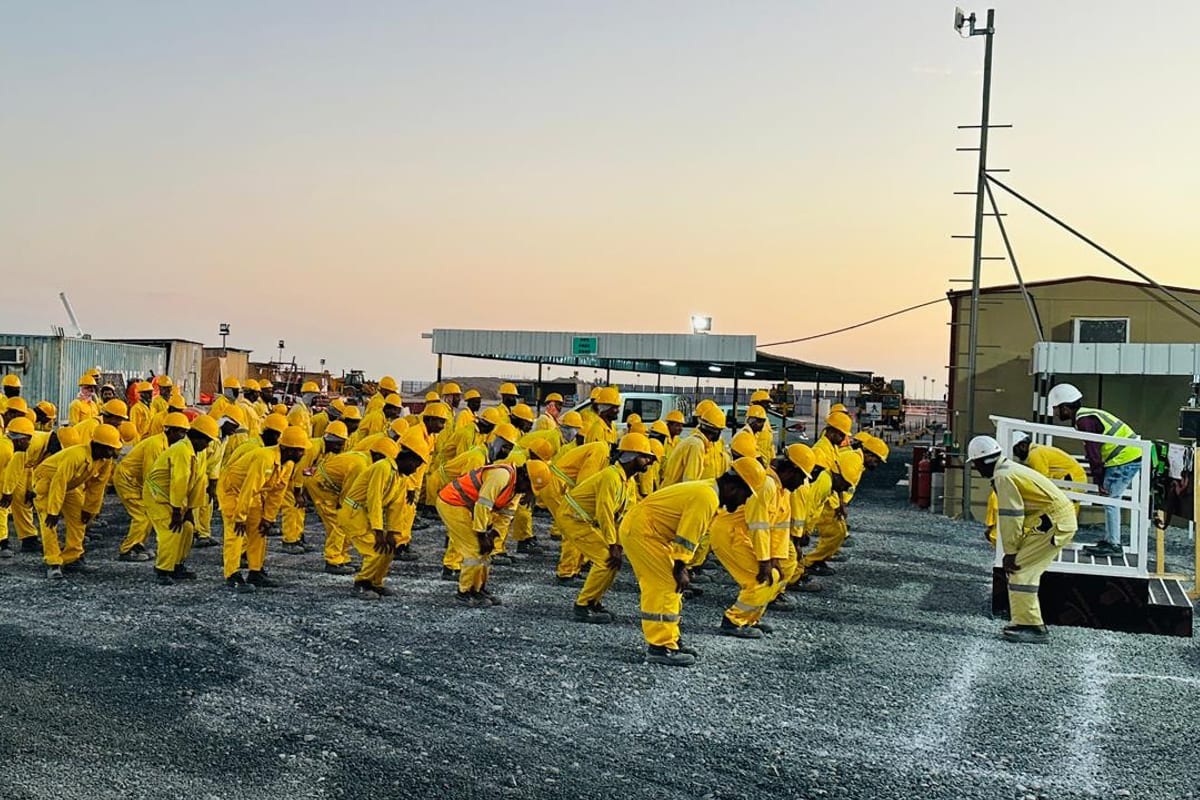 A dawn muster — every trade, every shift